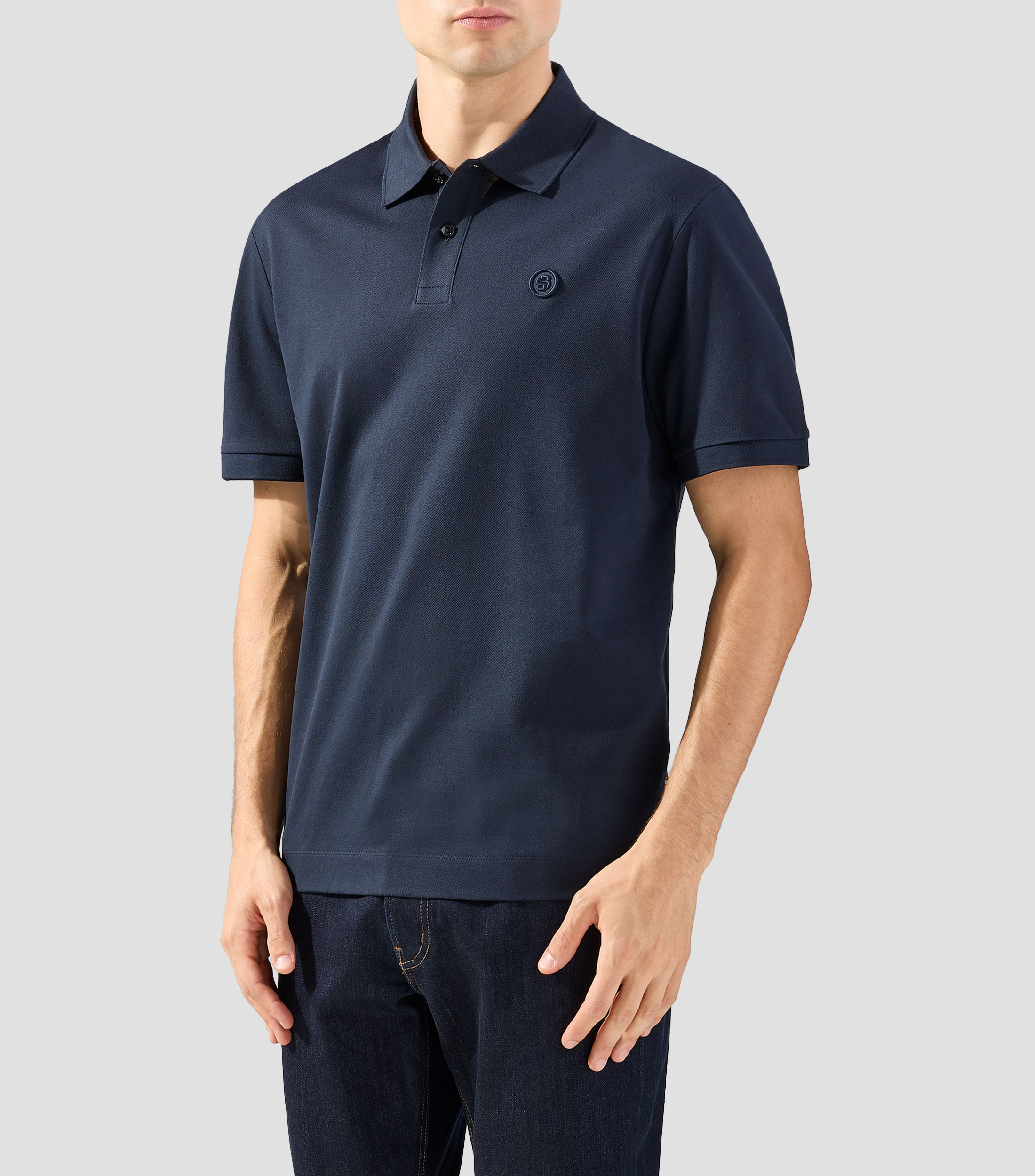 Playera tipo polo de manga corta lisa Hombre